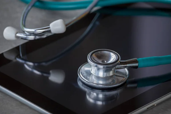 Health care concept, stethoscope on digital tablet