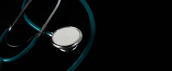 Stethoscope on black background, Stethoscope Concept of medicine and diagnostics.