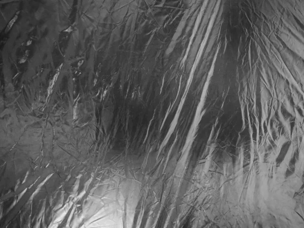 Alüminyum folyo, soyut grunge arkaplan, tahıllı fotokopi, siyah beyaz.