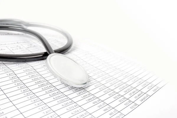 Financial Health Concepts, Financial Numbers Table and Doctor Stethoscope