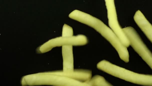 Slow Motion Fallen French Fries Black Background Batatas Fritas Lanche — Vídeo de Stock