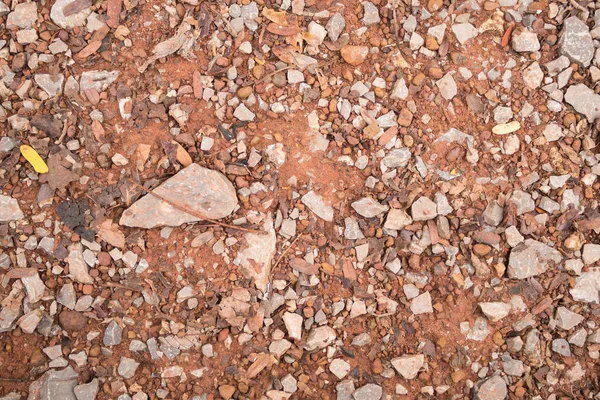 Tiny Rock lub kamień i czerwony brązowy żwir tekstury tła — Zdjęcie stockowe