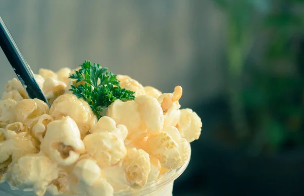 Sweet Caramel Popcorn and Whipped Cream and Fresh Milk with Parsley Side Vintage