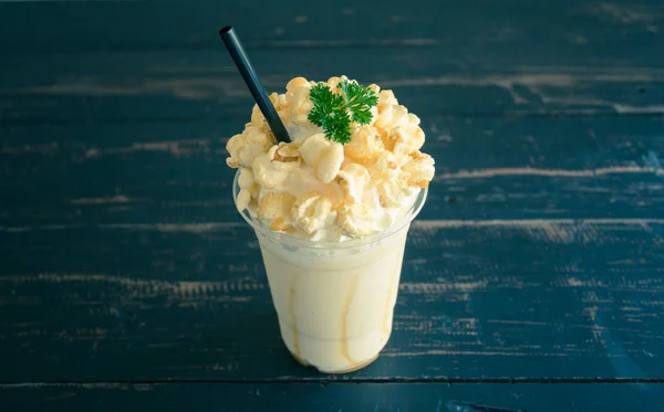 Sweet Caramel Popcorn and Whipped Cream and Fresh Milk with Parsley Vintage