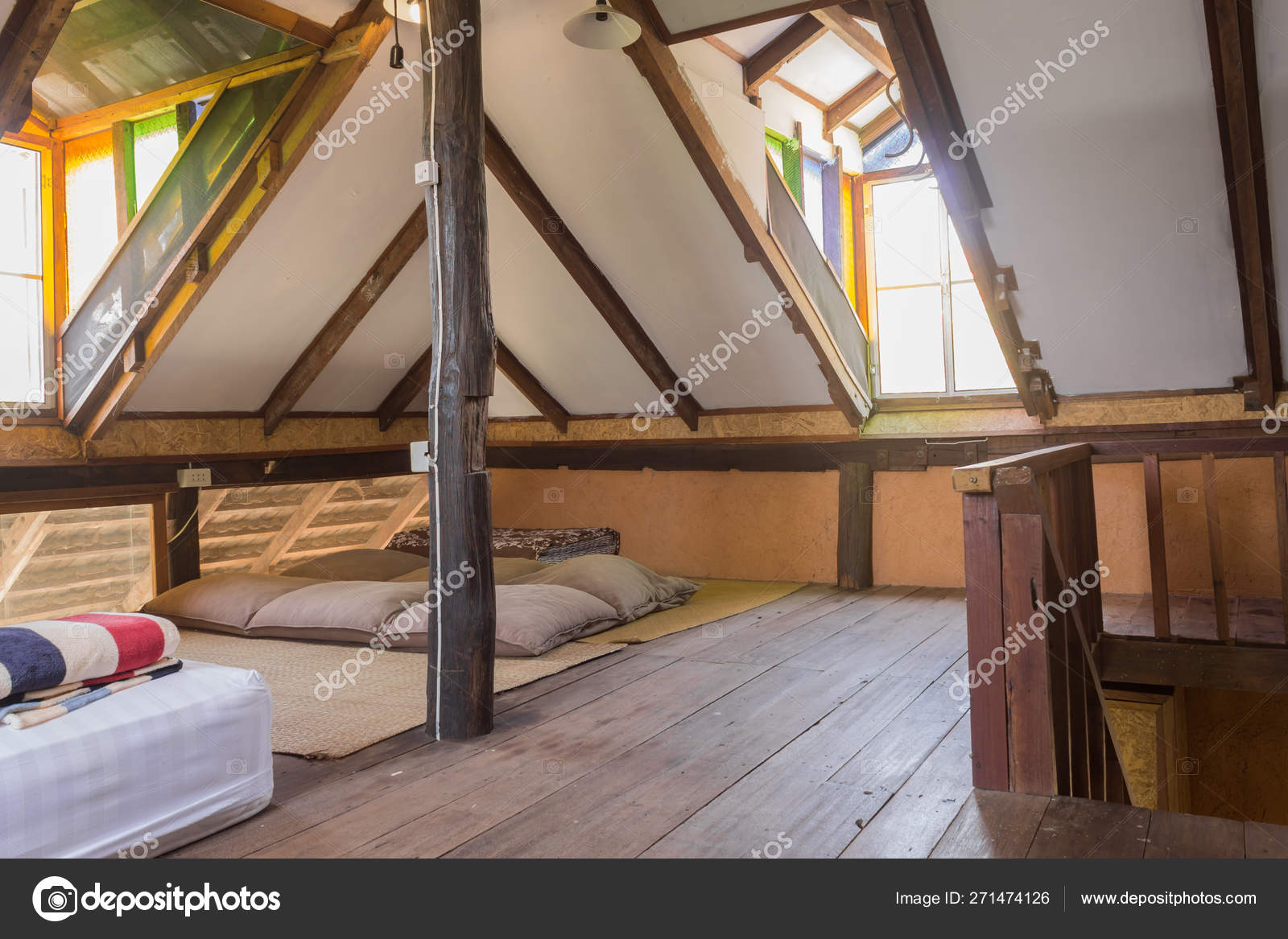 White And Brown Bed In Bedroom Of Country Loft Interior