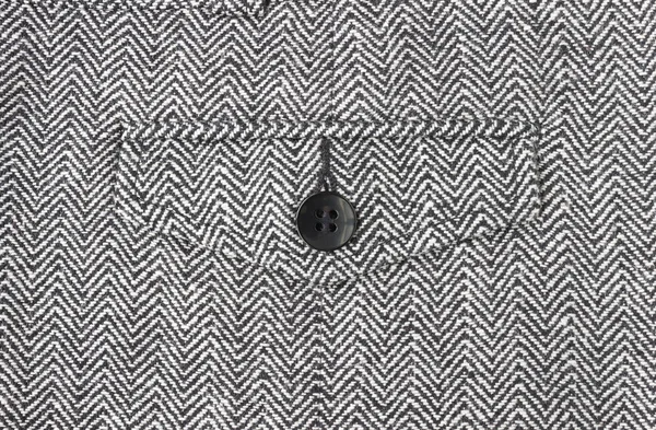 1 μαύρο κουμπί στο σχέδιο ζιγκ ζαγκ ή τρίγωνο μοτίβο στο κέντρο — Φωτογραφία Αρχείου