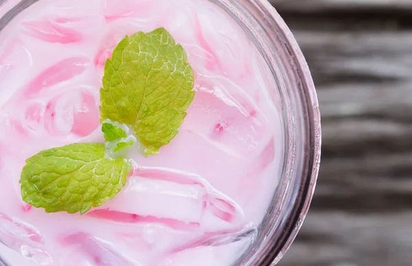 Pink Cold Milk Beverage or Cold Drinks and Peppermint Flatlay Le