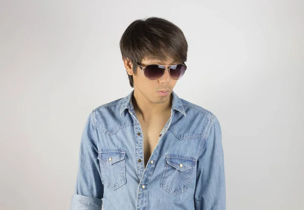 Portrait Man in Jeans Shirt Fashion Wear Eyeglasses Looking Belo