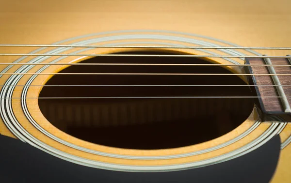 Sound Hole and Acoustic Guitar String Stock Photo