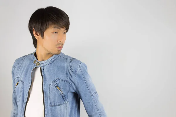Young Asian Man in Jeans or Denim Jacket on Left Frame