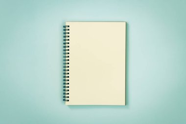 Spiral Notebook veya Spring Notebook in Unline Type on Blue Pastel Minimalist Arkaplan in Vintage Tone