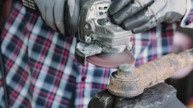 Zoom Front View Construction Industrial Factory or Metalwork Concept by Tamirci veya Teknisyen Grinder with Auto Part Workshop