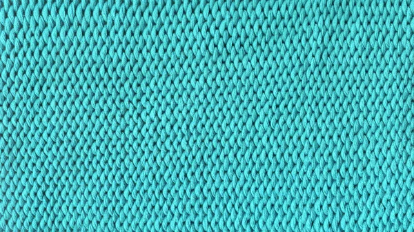 Green knitted fabric texture Stock Photo