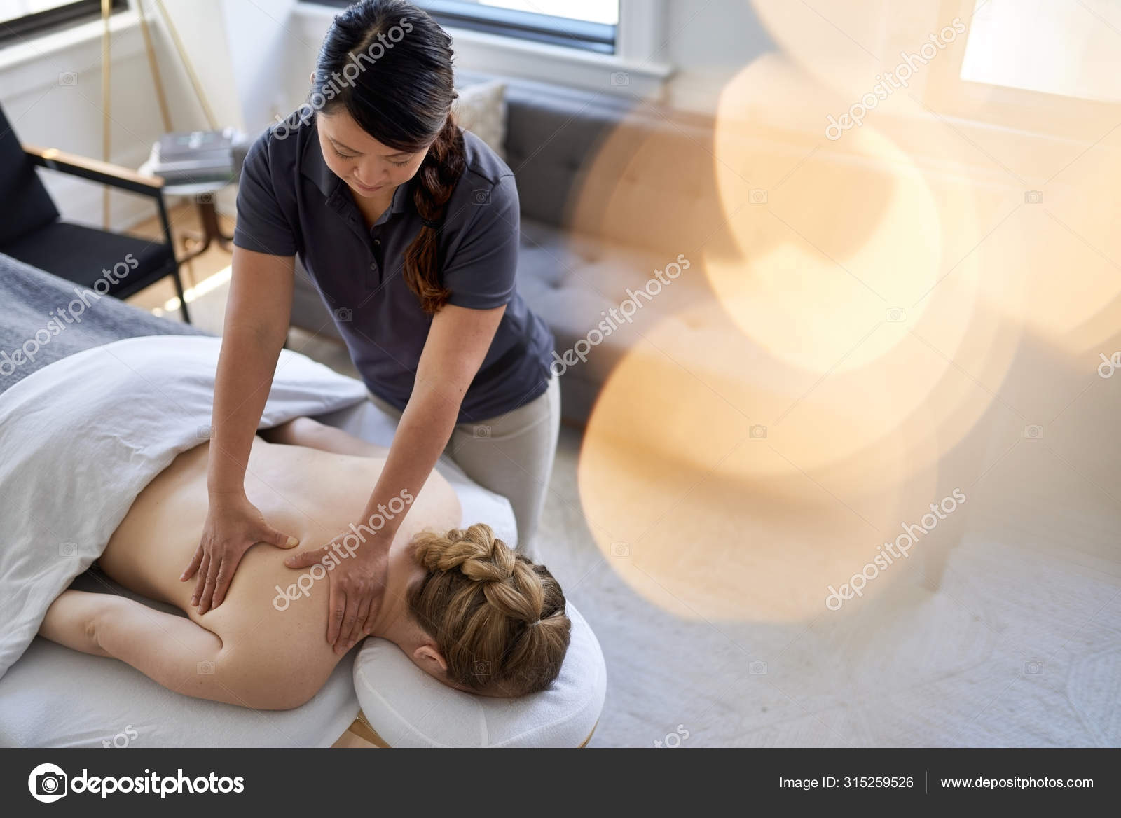 man giving woman massage