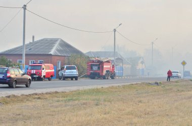 İtfaiyecilerin elementlere karşı mücadelesi