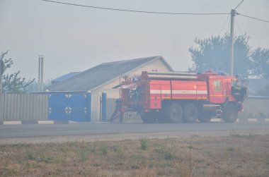 İtfaiyecilerin elementlere karşı mücadelesi