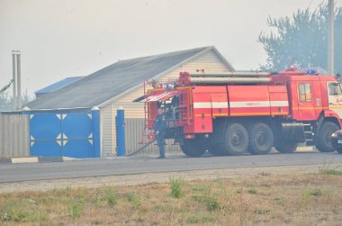 İtfaiyecilerin elementlere karşı mücadelesi