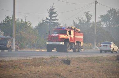 İtfaiyecilerin elementlere karşı mücadelesi