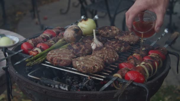 Outdoor grill with beef and vegatables in slow motion. — Stock Video