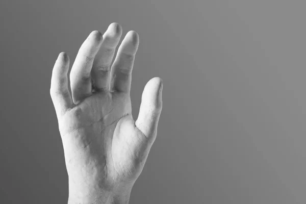 Elegante Mano Yeso Blanco Sobre Fondo Gris —  Fotos de Stock