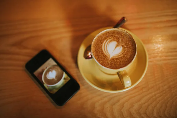 Cup Coffee Heart Foam Mobile Phone Next — Stock Photo, Image