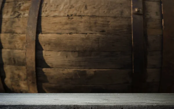 background of barrel and worn old table of wood