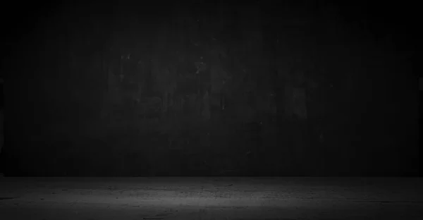 Piso de cemento en habitación oscura con luz de punto. fondo negro . — Foto de Stock