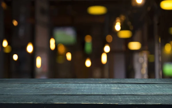 Blurred background of bar and dark brown desk space of retro wood — Stock Photo, Image