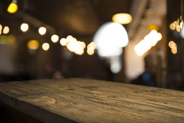 Blurred background of bar and dark brown desk space of retro wood — Stock Photo, Image