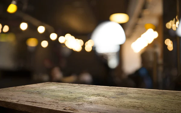 Blurred background of bar and dark brown desk space of retro wood — Stock Photo, Image