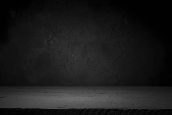 Цементна підлога в темній кімнаті з точковим світлом. чорний фон . — стокове фото