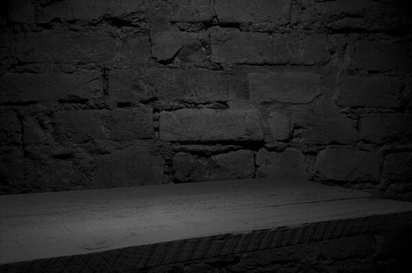 Selected focus empty wooden table and wall texture or old brick wall blur background image. for your photomontage or product display.