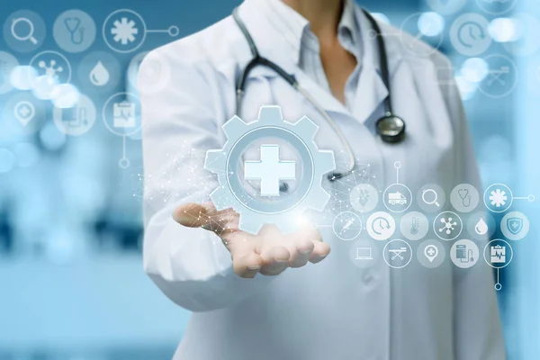 Arzt Unterstützt Medizinisches Gerät Symbol Auf Blauem Hintergrund — Stockfoto