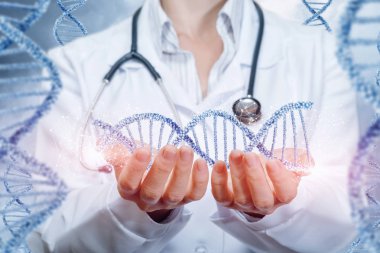 Bir doktor bir stetoskop ile bir dna çizgi her iki tarafta aynı zincirlerle onun elinde tutuyor. Gelecek nesiller etkisi modern tıbbın bir kavramdır.