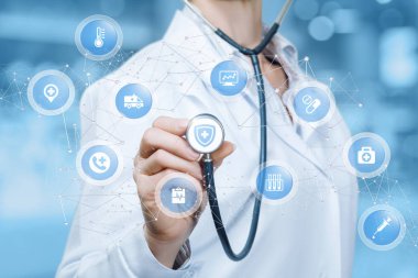 Bir doktor kablosuz bağlantılar tıbbi kutsal kişilerin resmi iç ile küçük küreler içeren dijital bir düzeni dokunuyor. Sağlık koruma bir kavramdır.
