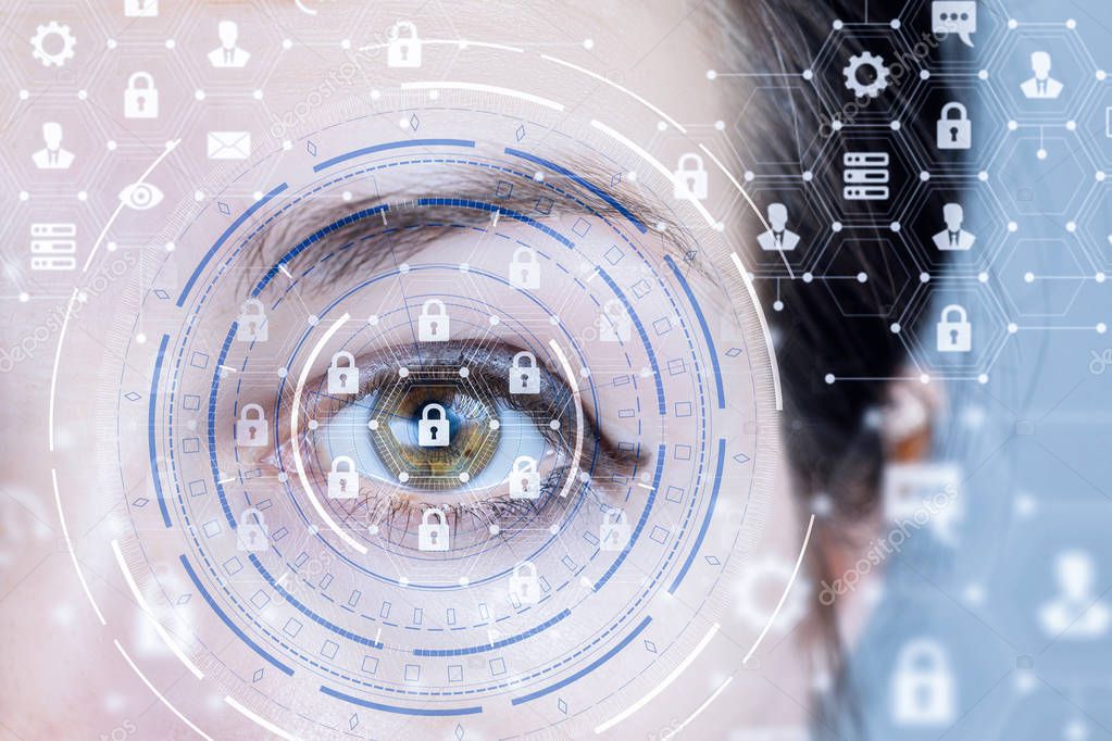A closeup of a human eye with cyber security system structure. The concept of data and digital protection and security.