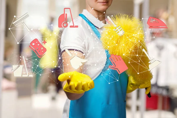 A worker is holding a cleaning service structure. — Stock Photo, Image