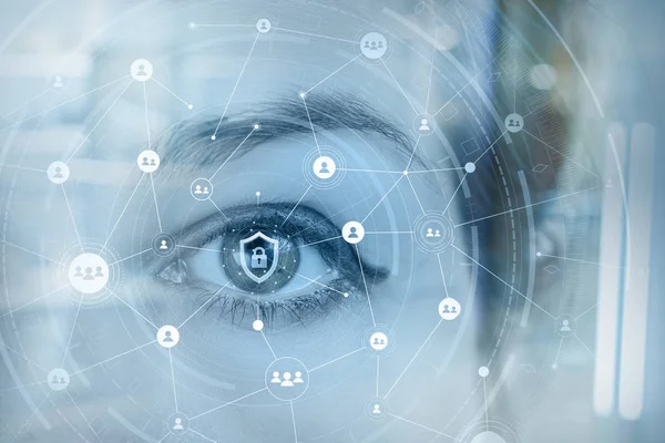 A human eye behind a data security system. — Stock Photo, Image