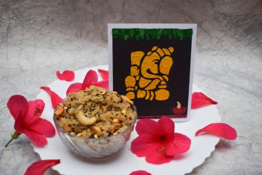 Panchakajjaya is kannada speciality more of udapi side made dusing Ganesh chaturthi, janmasthami festivals as Naivedyam. Mixture of 5 elements dal, jaggery, coconut, ghee, cashewnuts clipart