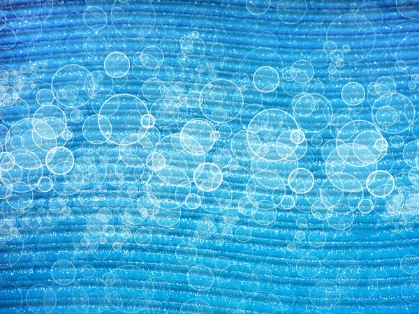 Fondo azul abstracto con bokeh similar a las burbujas de aire en el agua. — Foto de Stock