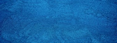 Dokulu alçı, tasarımın için kaba mavi arkaplan. Metin için alanı olan soyut afiş. Yılın rengi