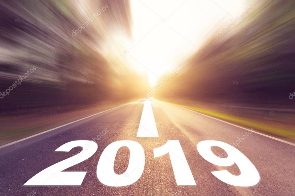 Empty blur asphalt road and New year 2019 concept. Driving on an empty road to Goals 2019.