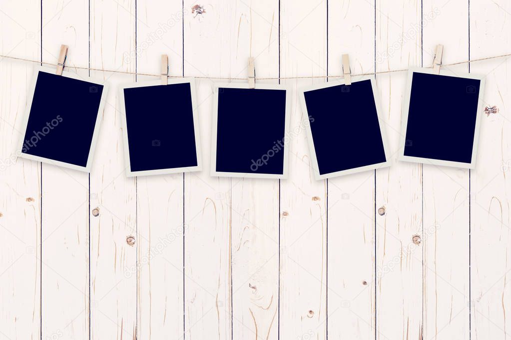 Five instant photo on Wood Background and Texture vertical, Vintage toned.