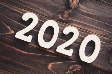 2020 Yeni yıl konsepti : masa arka plan üzerinde 2020 ahşap numarası.