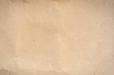 Buruşmuş kahverengi kağıt dokusu ve arkaplanı kapat