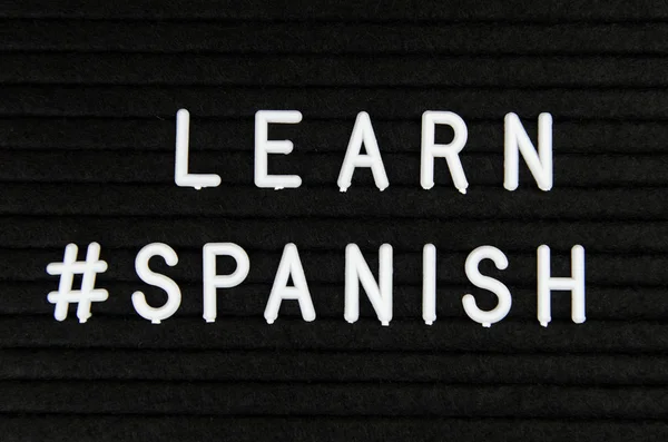 Learn Spanish Sign Black Background — Stock Photo, Image