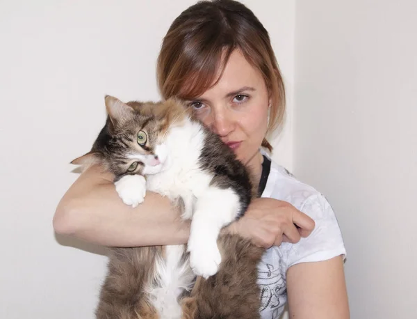 Mature woman with a cat