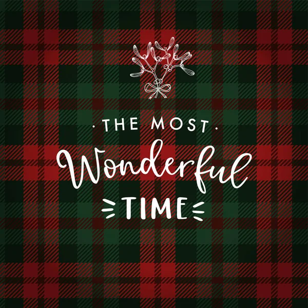 The most wonderful time. Christmas greeting card, invitation with hand drawn mistletoe and white text over tartan checkered plaid. Winter vector calligraphy illustration background. — Stock Vector