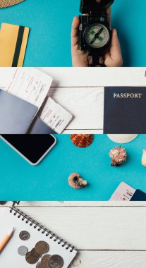 pasaport kolajı deniz kabukları, para, akıllı telefon, kadın eli pusula ve mavi ve ahşap arka planlı kalem, seyahat kavramı