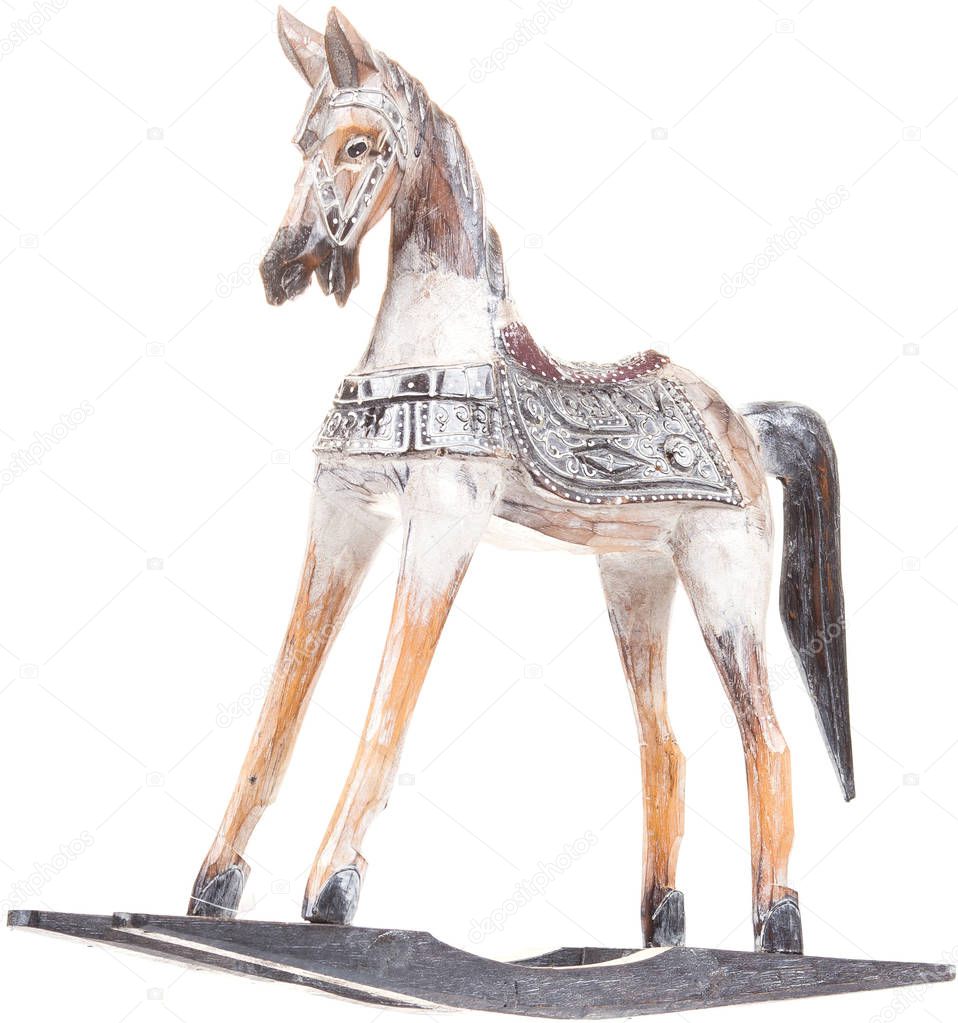 Vintage rocking horse isolated on white background